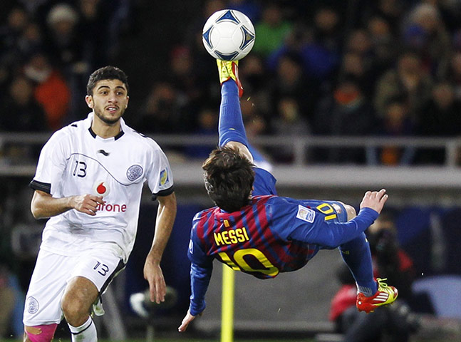 Best of the sport week: Messi of Spain's Barcelona attempts an bicycle kick against Qatar's Al Sadd