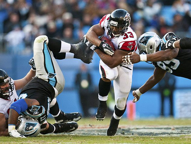 Best of the sport week: Atlanta Falcons' Michael Turner runs through the Carolina Panthers defence