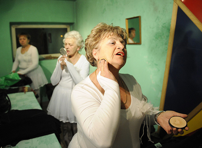 24 hours in pictures: Lazy, Poland: Members of the Barborka pensioniers dancers group