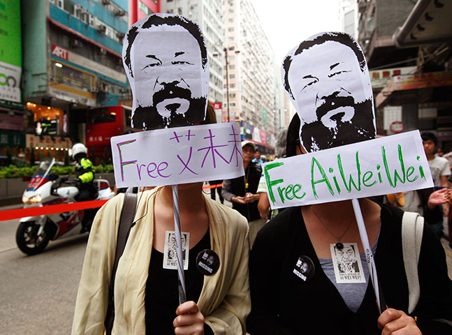 Faces of the year: Demonstrators call for the release of Ai Weiwei