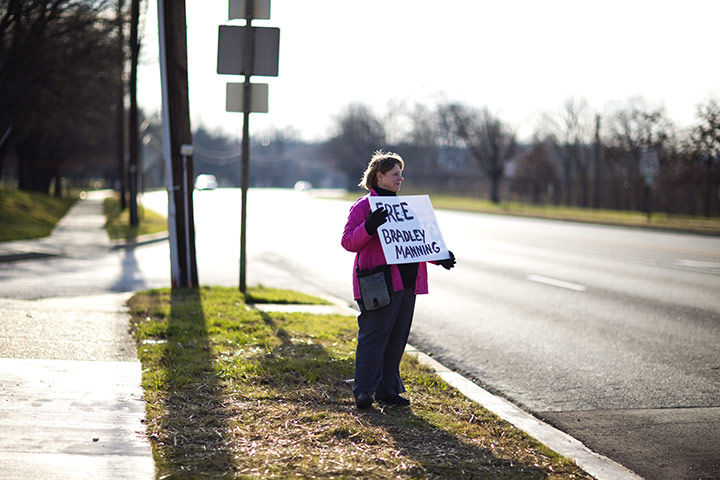 24 hours: Joan Stallard holds a sign in support of WikiLeaks suspect Bradley Manning