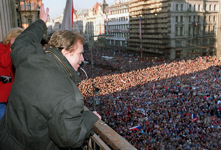 Vaclav Havel: 1989: Vaclav Havel waves to the crowd gathered on Prague's Wenceslas Square