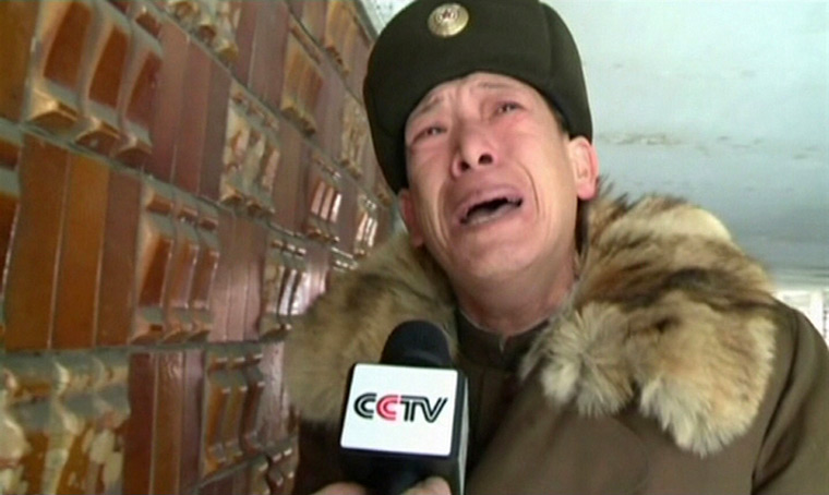 Reaction to Kim Jong il: A man cries over the death of North Korean leader Kim Jong-il in Pyongyang 