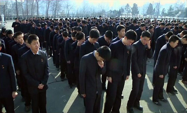 Reaction to Kim Jong il: Students of Pyongyang Secondary School No. 1 gather as they mourn