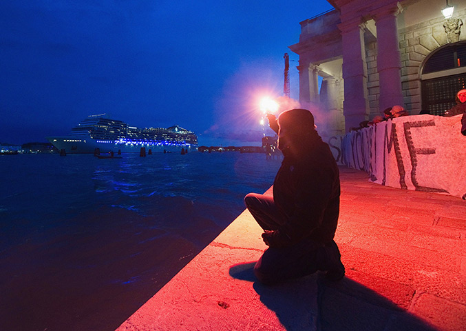 24 hours: Venice, Italy: A protester against large cruise ships 