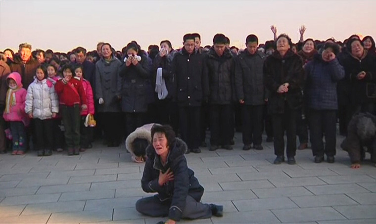 Kim Jong-il death: A woman cries at a square in Pyongyang