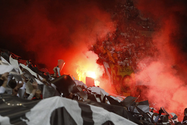 The week in sport: Legia Warsaw's fans at a Europa League game against PSV Eindhoven