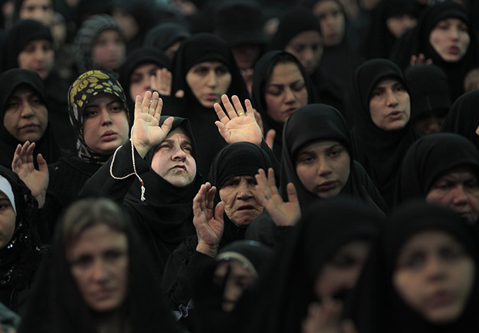 24 hours in pictures: Beirut, Lebanon: Supporters pray before a speech by Sheik Hassan Nasrallah