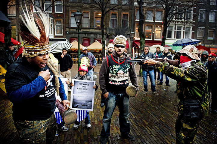 24 hours in pictures: Papua, Indonesia: Protesters take part in a commemoration