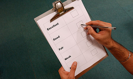 Man holding pen and clipboard