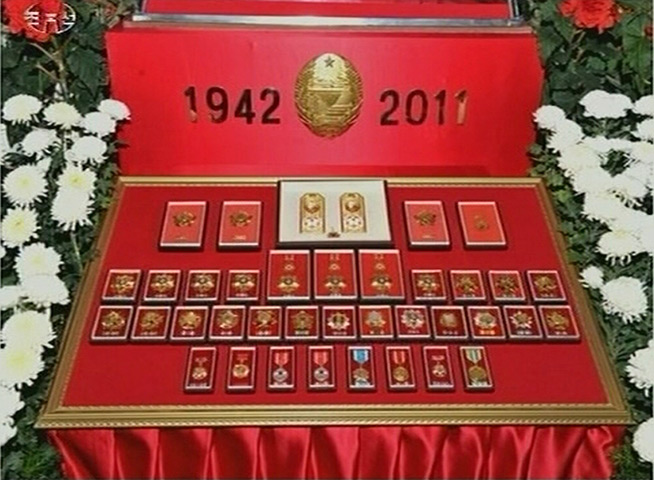 Kim Jong-il: Medals belonging to Kim Jong-il are displayed as he lies in state