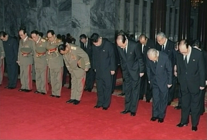 Kim Jong-il lies in state: Kim Jong-un and high level party members pay their respects to Kim Jong-il