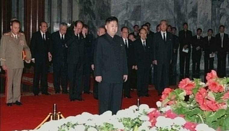 Kim Jong-il lies in state: New North Korean ruler Kim Jong-un pays his respects to his father