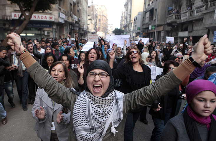women protest in cairo: Women chant anti-military slogans on the sreet in Cairo