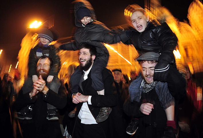 Hanukkah: People celebrate the first day of Hanukkah, at Nyugati square in Budapest