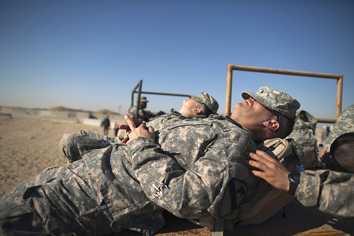FTA: Lucas Jackson: Soldiers sleep while waiting for processing at Camp Virginia, Kuwait 