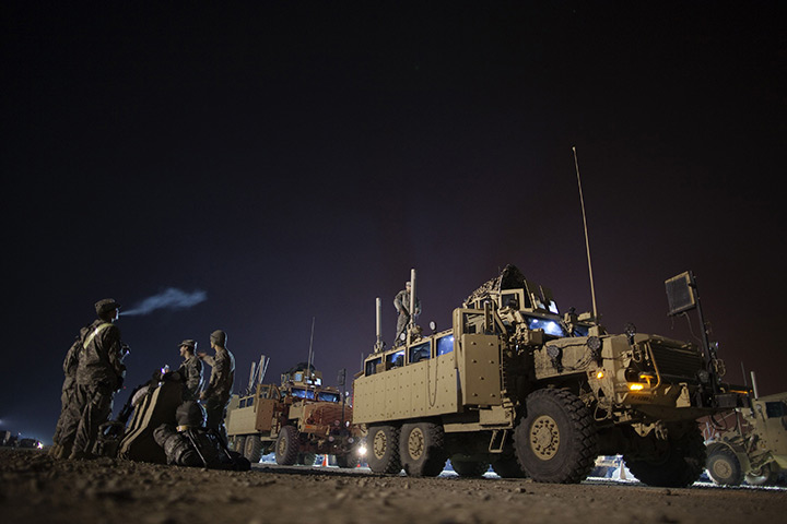 FTA: Lucas Jackson: Soldiers prepare their Mine Resistant Ambush Protected vehicles (MRAP)