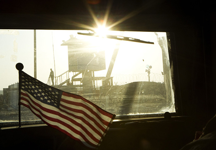 FTA: Lucas Jackson: A guard stands on the border of Kuwait 