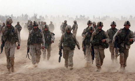 US soldiers return to their barracks at a military base outside Fallujah