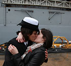 Marissa Gaeta, left, kisses her girlfriend of two years, Citlalic Snell