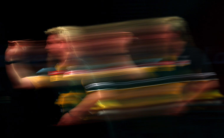 Week in Sport: Simon Whitlock in action at the 2012 Ladbrokes.com World Darts Championship