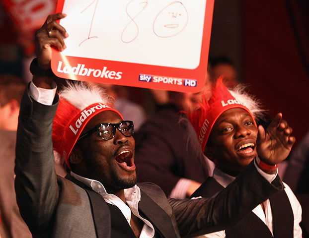 Week in Sport: Chelsea's Michael Essien at the 2012 Ladbrokes.com World Darts Championship
