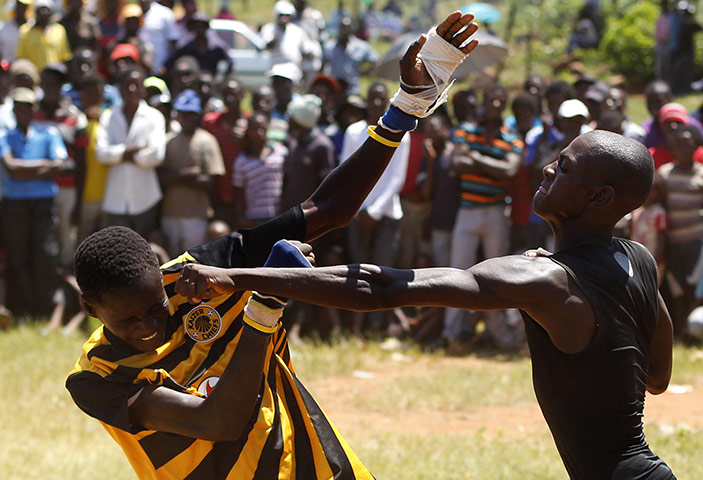 Week in Sport: Fist fighters during the Musangwe at Gaba Village in Limpopo province