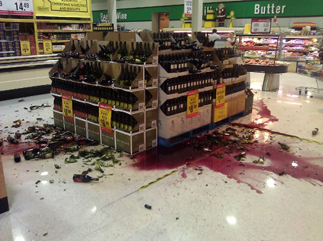 Christchurch earthquake: Bottles of wine lie smashed on the floor of a supermarket