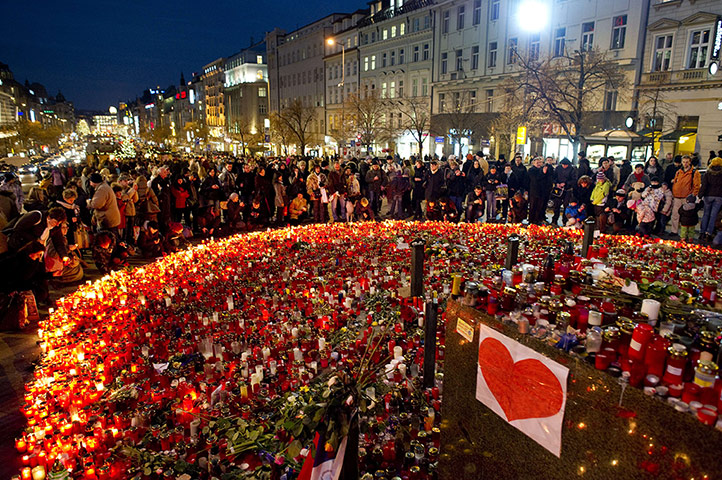 24 hours in pictures: Prague, Czech Republic: People light candles for Vaclav Havel