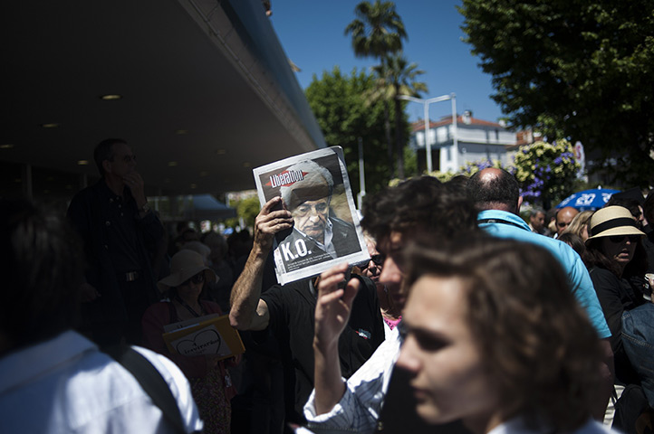 Year in review: Business: A man sells the Liberation newspaper 