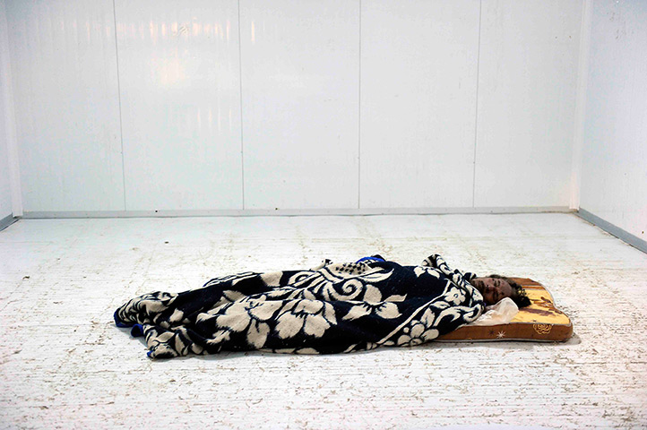 g2 pictures of the year: the body of Muammar Gaddafi