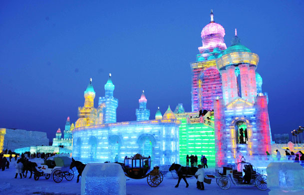 24 hours in pictures: Harbin, China: Tourists visit the Ice and Snow World
