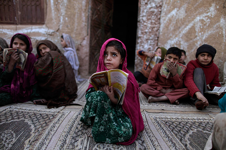 24 hours in pictures: a girl in a pakistani madrassa