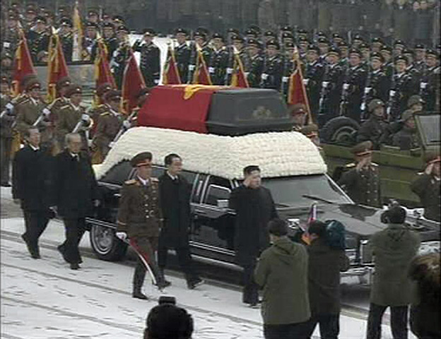 Kim Jong-il funeral: Kim Jong-un and his uncle Jang Song-thaek accompany the hearse 