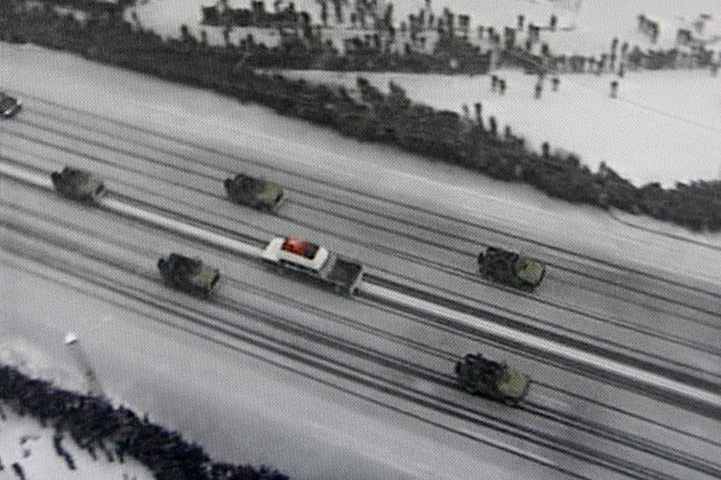 Kim Jong-il funeral: The hearse maqqkes its way through Pyongyang