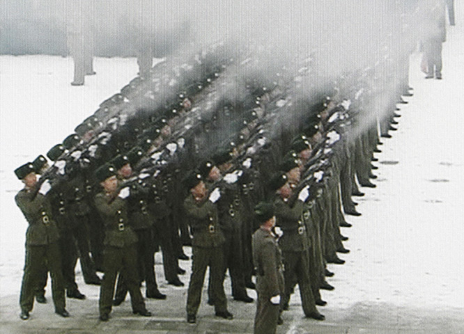 Kim Jong-il funeral: North Korean military personnel fire guns during the funeral