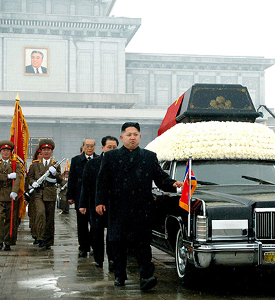 Kim Jong-il funeral: Kim Jong-Un walks besides the convoy carrying the body of his father