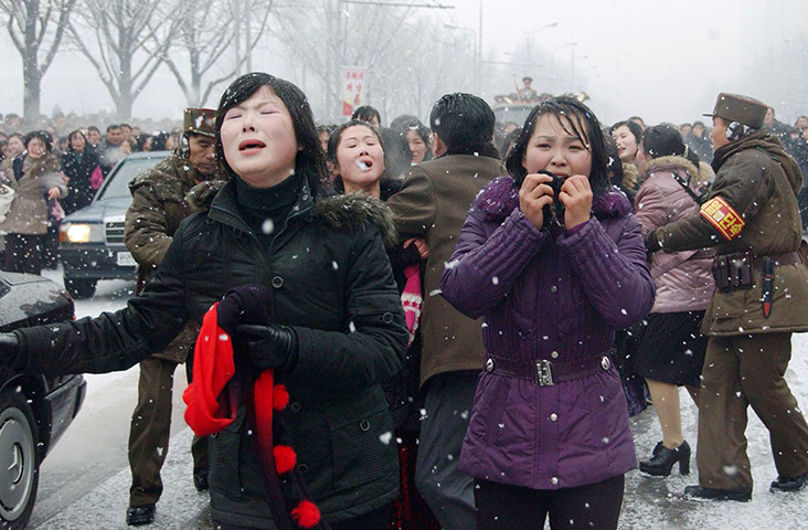 Kim Jong-il funeral: Mourners cry during the funeral procession