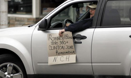 Protester outside Mitt Romney event in Iowa