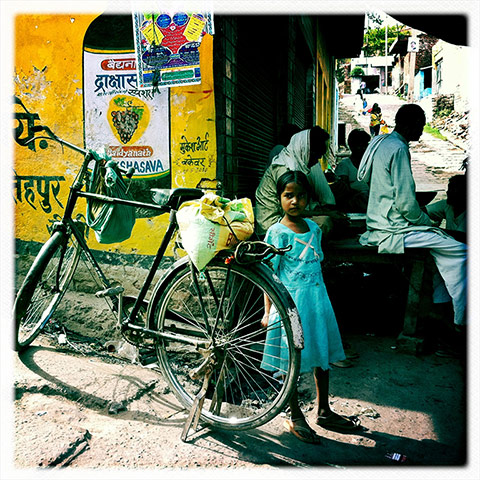 iPhone photos of the year: A young girl waiting on the streets near in Uttar Pradesh, India