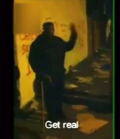 Camera phones: 9 August 2011: Pauline Pearce making a stand against looters