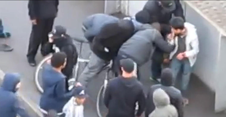 Camera phones: 9 August 2011: Asyraf Haziq initially being helped up during looting