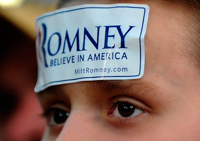 Iowa campaigning: A young supporter of republican presidential hopeful Mitt Romney