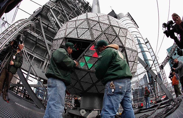 New year preparations: New York, USA: Workers install crystals on the Times Square Ball 