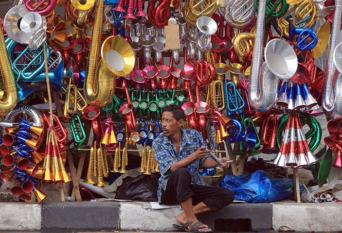 New year preparations: Jakarta, Indonesia: An Indonesian vendor waits for customers