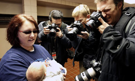 Baby and photographers in Iowa