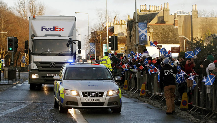 Pandas in Edinburgh: Pandas Tian Tian and Yang Guang arrive under police escort