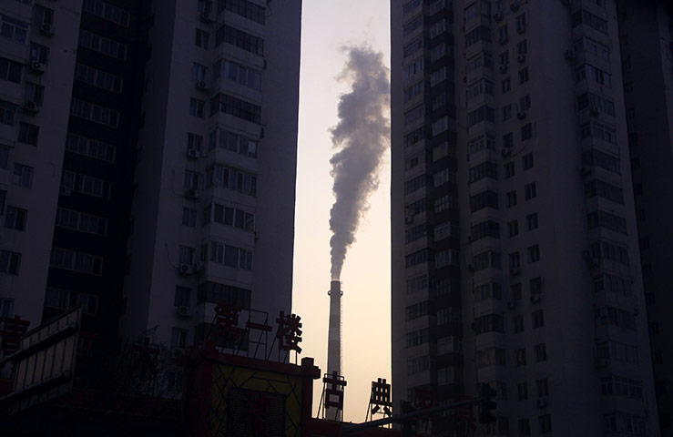 24 hours in pictures: a coal burning heating system for apartment blocks in central Beijing