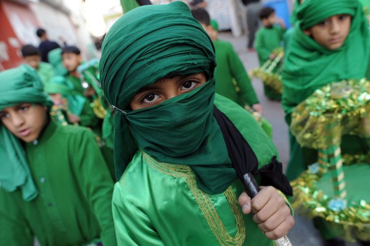 24 hours in pictures: Sanabis, Bahrain: Shia Muslim children take part in ceremonies for Ashura