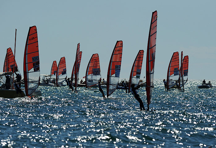 24 hours in pictures: Fremantle, Australia: Competitors in the RS:X  Women's Windsurfer event